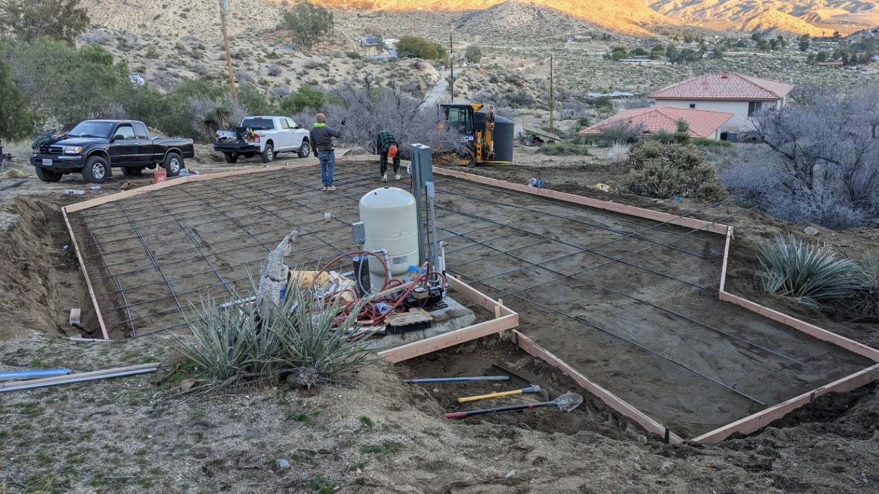 Concrete foundation forming with rebar grid