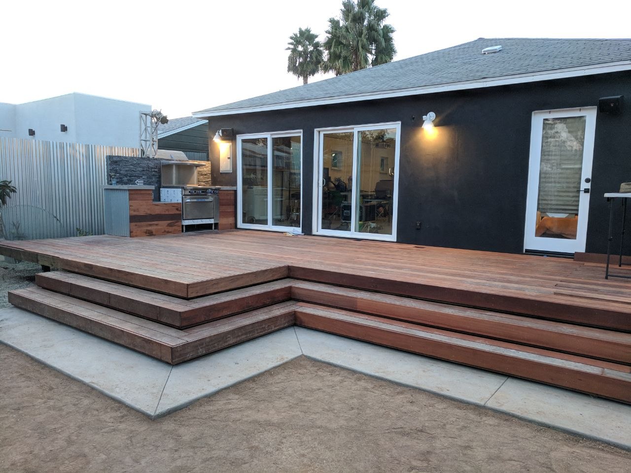 Finished outdoor wood deck and kitchen