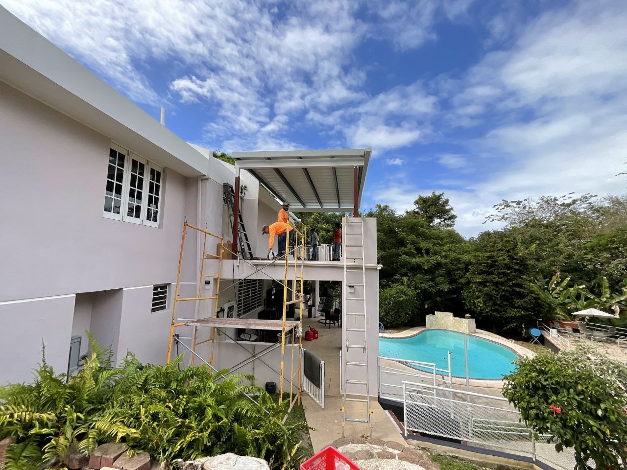 Completed iron pergola frame mounted to the deco home