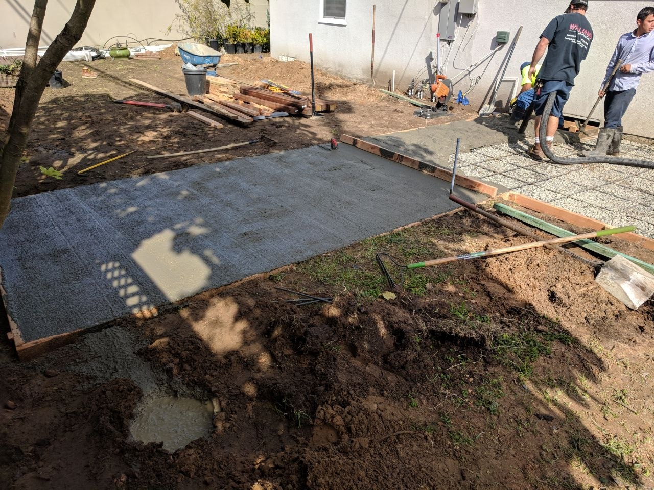 Concrete pouring and leveling for the driveway