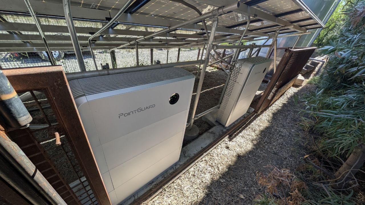 Dual PointGuard Energy battery units housed beneath the solar canopy